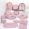 Baby-Komplettset in Rosa – Babynest, Wickelunterlage, Stillkissen & Kinderwagenzubehör für Neugeborene.